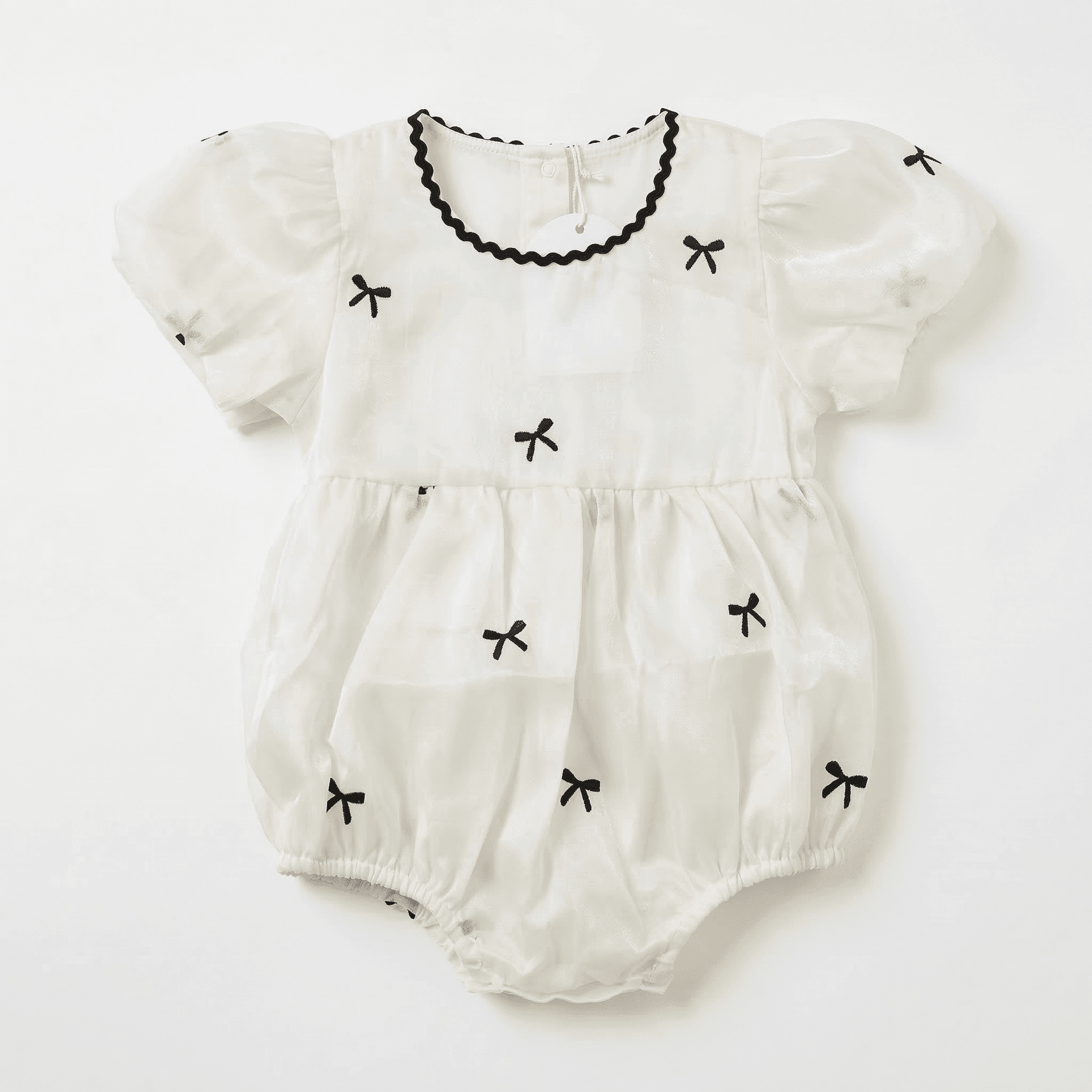 Romper Blanco Moñitos Negros